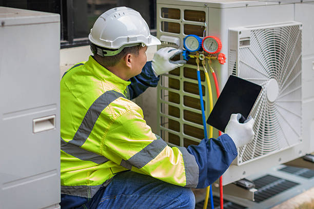 Professional Ductwork Repair technician working in Uxbridge, MA